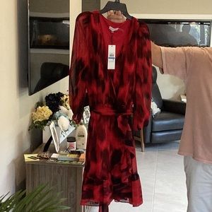 Calvin Klein red and black flowy knee length dress. Fully lined with sash belt!